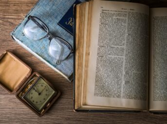 book, glasses, watch